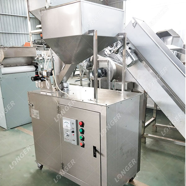 Alat Pengiris Kacang Otomatis di China.jpg